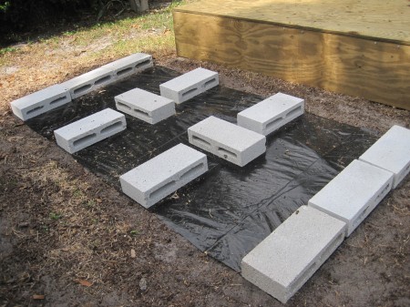 cement blocks on black plastic